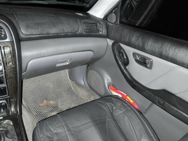 Зеленый Субару Легаси, объемом двигателя 2.5 л и пробегом 250 тыс. км за 2900 $, фото 4 на Automoto.ua