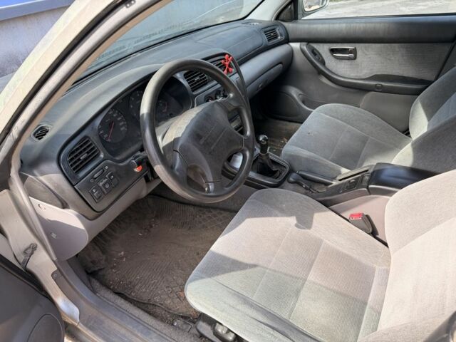 Зеленый Субару Легаси, объемом двигателя 2 л и пробегом 300 тыс. км за 1300 $, фото 6 на Automoto.ua