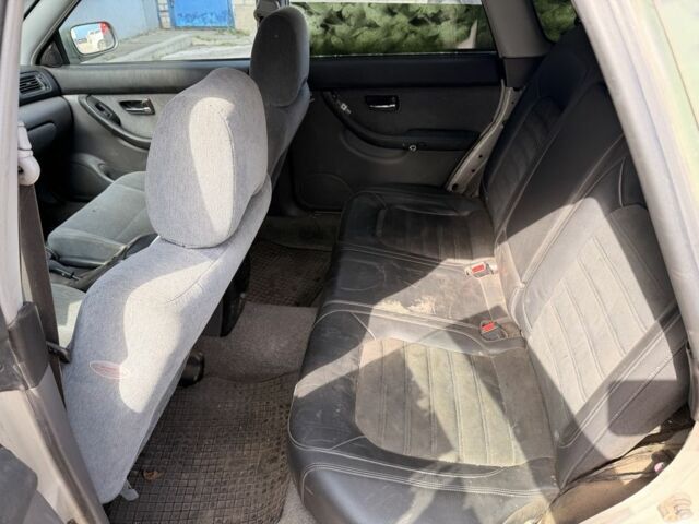 Зеленый Субару Легаси, объемом двигателя 2 л и пробегом 300 тыс. км за 1300 $, фото 7 на Automoto.ua