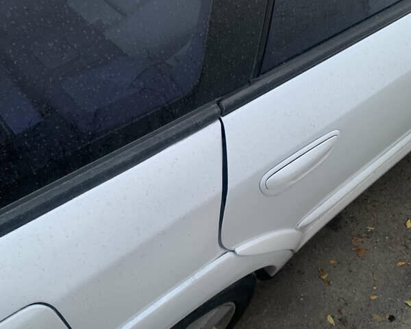 Білий Субару Аутбек, об'ємом двигуна 3 л та пробігом 111 тис. км за 2500 $, фото 4 на Automoto.ua