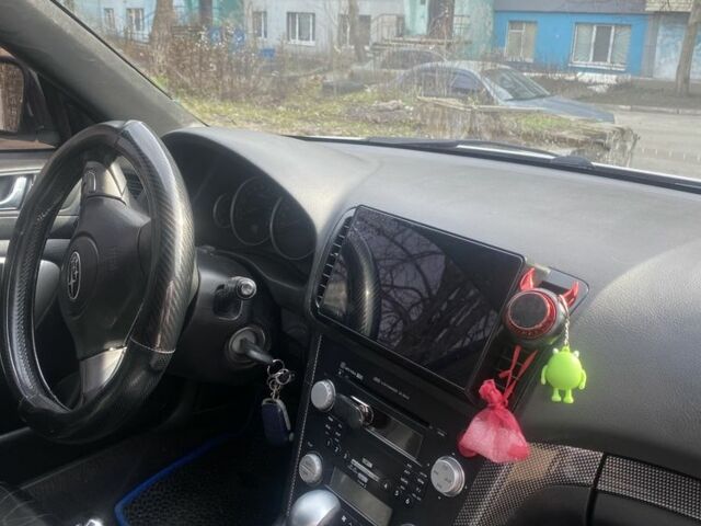 Белый Субару Аутбек, объемом двигателя 2.5 л и пробегом 227 тыс. км за 6200 $, фото 6 на Automoto.ua