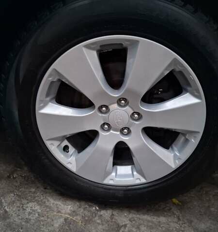 Белый Субару Аутбек, объемом двигателя 2.46 л и пробегом 166 тыс. км за 10500 $, фото 2 на Automoto.ua