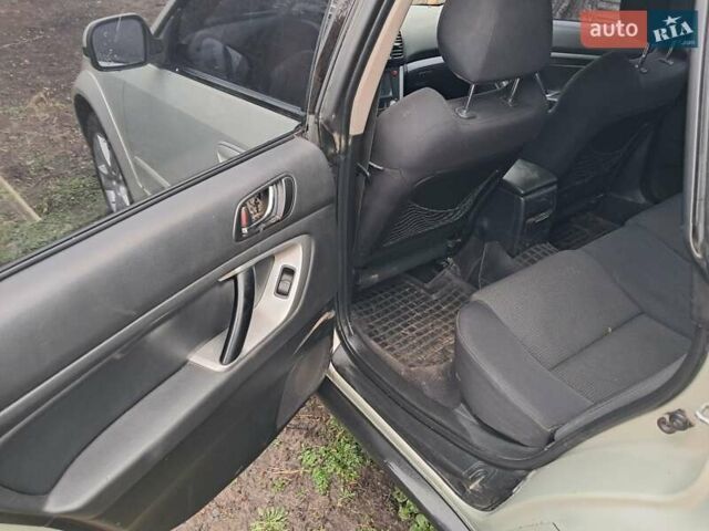 Бежевый Субару Аутбек, объемом двигателя 2.5 л и пробегом 290 тыс. км за 6000 $, фото 7 на Automoto.ua