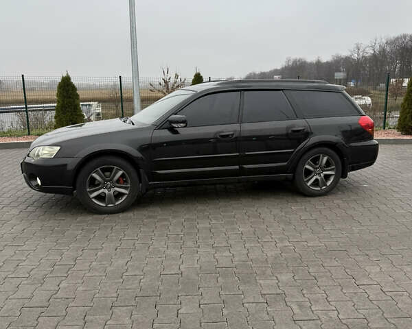 Черный Субару Аутбек, объемом двигателя 2.46 л и пробегом 289 тыс. км за 6000 $, фото 3 на Automoto.ua