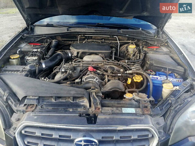 Черный Субару Аутбек, объемом двигателя 2.46 л и пробегом 252 тыс. км за 5650 $, фото 9 на Automoto.ua