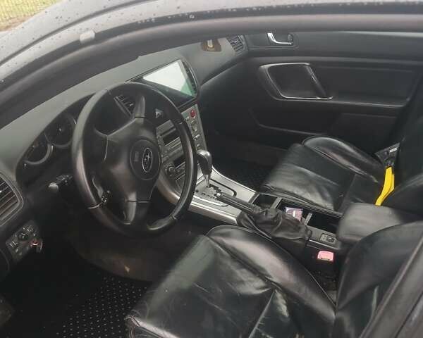 Черный Субару Аутбек, объемом двигателя 2.46 л и пробегом 300 тыс. км за 5199 $, фото 1 на Automoto.ua