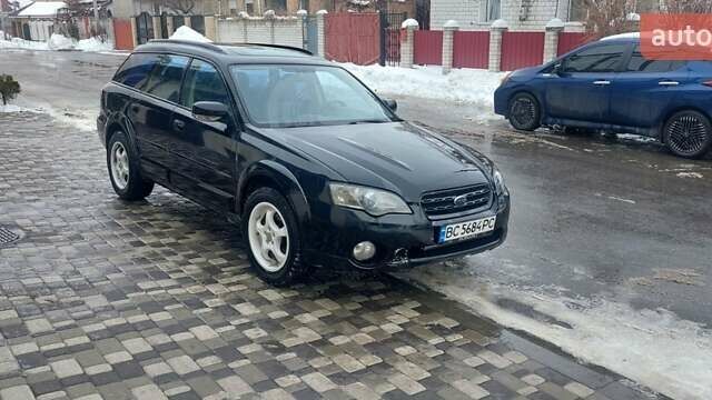 Черный Субару Аутбек, объемом двигателя 2.5 л и пробегом 345 тыс. км за 4900 $, фото 2 на Automoto.ua