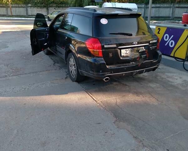 Черный Субару Аутбек, объемом двигателя 2.46 л и пробегом 316 тыс. км за 5600 $, фото 9 на Automoto.ua