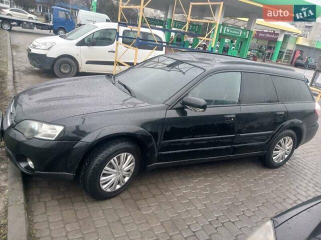 Черный Субару Аутбек, объемом двигателя 2.46 л и пробегом 300 тыс. км за 5199 $, фото 4 на Automoto.ua
