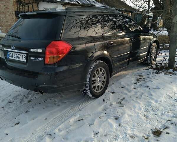 Черный Субару Аутбек, объемом двигателя 2.46 л и пробегом 316 тыс. км за 5600 $, фото 1 на Automoto.ua