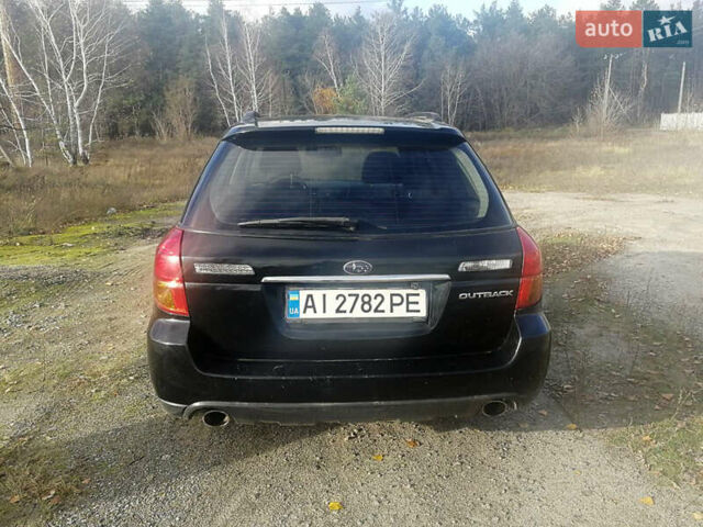 Черный Субару Аутбек, объемом двигателя 2.46 л и пробегом 252 тыс. км за 5650 $, фото 1 на Automoto.ua