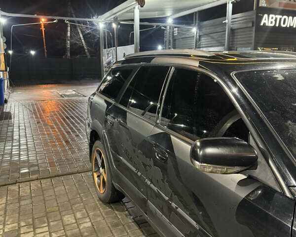 Черный Субару Аутбек, объемом двигателя 2.99 л и пробегом 450 тыс. км за 6500 $, фото 3 на Automoto.ua