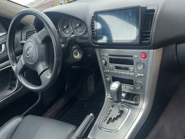 Черный Субару Аутбек, объемом двигателя 2.5 л и пробегом 344 тыс. км за 4800 $, фото 5 на Automoto.ua