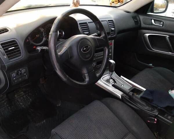 Черный Субару Аутбек, объемом двигателя 2.46 л и пробегом 316 тыс. км за 5600 $, фото 4 на Automoto.ua