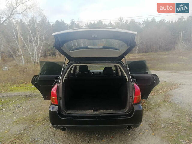 Черный Субару Аутбек, объемом двигателя 2.46 л и пробегом 252 тыс. км за 5650 $, фото 4 на Automoto.ua