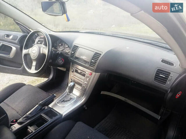 Черный Субару Аутбек, объемом двигателя 2.46 л и пробегом 252 тыс. км за 5650 $, фото 5 на Automoto.ua