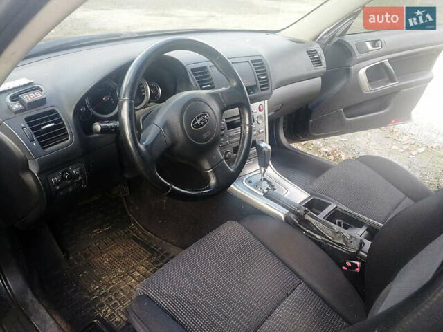 Черный Субару Аутбек, объемом двигателя 2.46 л и пробегом 252 тыс. км за 5650 $, фото 6 на Automoto.ua