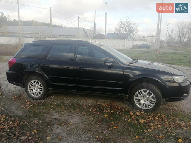 Черный Субару Аутбек, объемом двигателя 2.46 л и пробегом 252 тыс. км за 5650 $, фото 2 на Automoto.ua