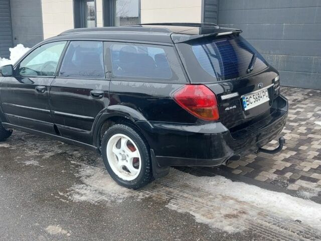 Черный Субару Аутбек, объемом двигателя 2.5 л и пробегом 344 тыс. км за 4800 $, фото 1 на Automoto.ua