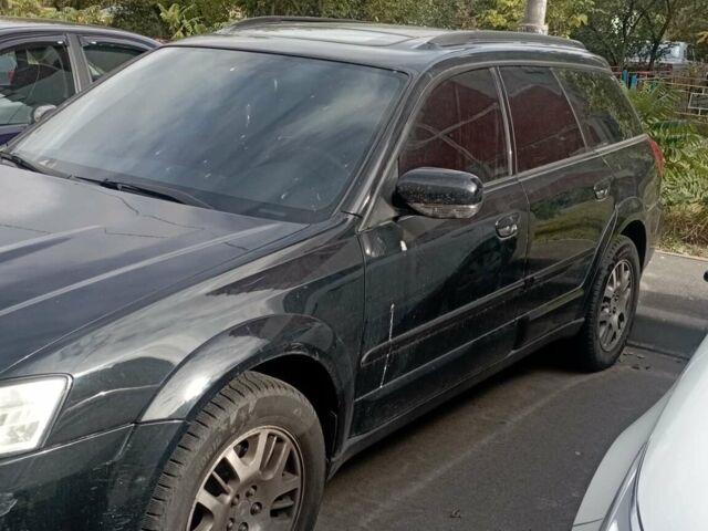 Черный Субару Аутбек, объемом двигателя 2.46 л и пробегом 300 тыс. км за 5200 $, фото 5 на Automoto.ua