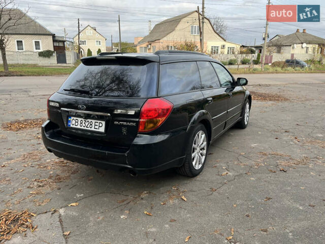 Черный Субару Аутбек, объемом двигателя 2.46 л и пробегом 220 тыс. км за 6700 $, фото 4 на Automoto.ua