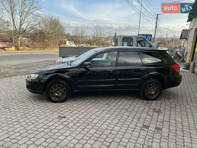 Чорний Субару Аутбек, об'ємом двигуна 2.5 л та пробігом 256 тис. км за 7500 $, фото 2 на Automoto.ua