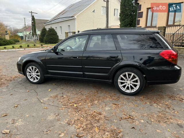 Черный Субару Аутбек, объемом двигателя 2.46 л и пробегом 220 тыс. км за 6700 $, фото 2 на Automoto.ua