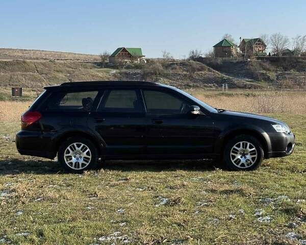 Черный Субару Аутбек, объемом двигателя 2.46 л и пробегом 370 тыс. км за 4800 $, фото 4 на Automoto.ua
