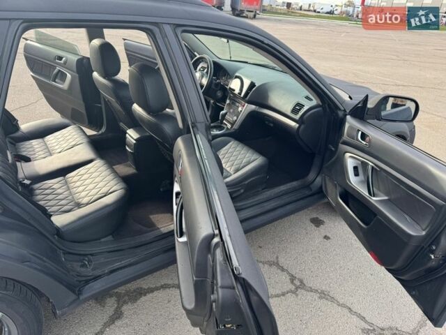 Черный Субару Аутбек, объемом двигателя 2.46 л и пробегом 275 тыс. км за 7700 $, фото 14 на Automoto.ua