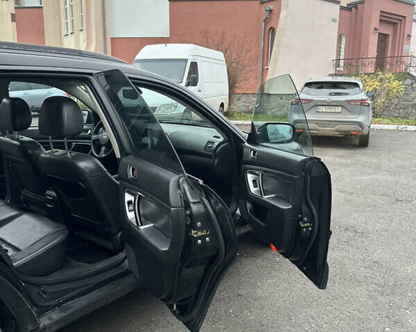 Черный Субару Аутбек, объемом двигателя 2.5 л и пробегом 256 тыс. км за 5400 $, фото 17 на Automoto.ua