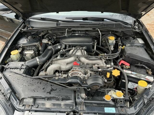 Черный Субару Аутбек, объемом двигателя 2.5 л и пробегом 250 тыс. км за 6700 $, фото 7 на Automoto.ua