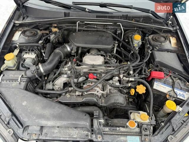 Черный Субару Аутбек, объемом двигателя 2.5 л и пробегом 245 тыс. км за 7700 $, фото 18 на Automoto.ua