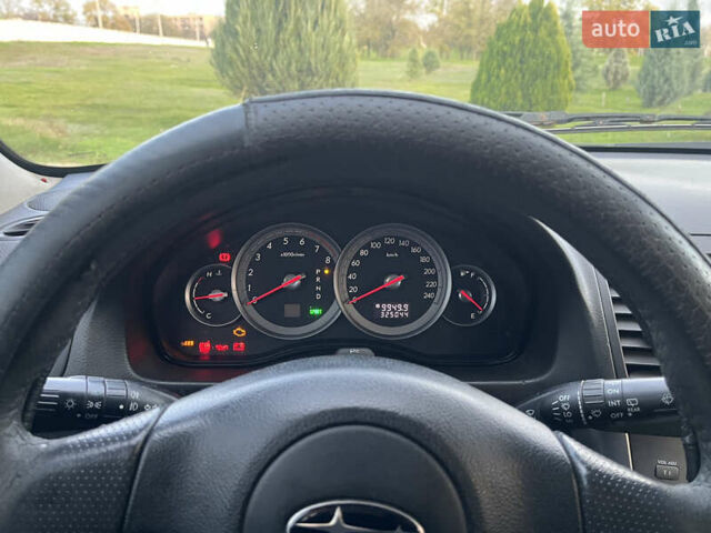 Черный Субару Аутбек, объемом двигателя 2.5 л и пробегом 325 тыс. км за 6600 $, фото 6 на Automoto.ua