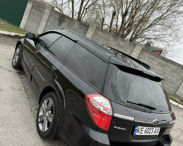 Черный Субару Аутбек, объемом двигателя 2.46 л и пробегом 263 тыс. км за 7300 $, фото 5 на Automoto.ua