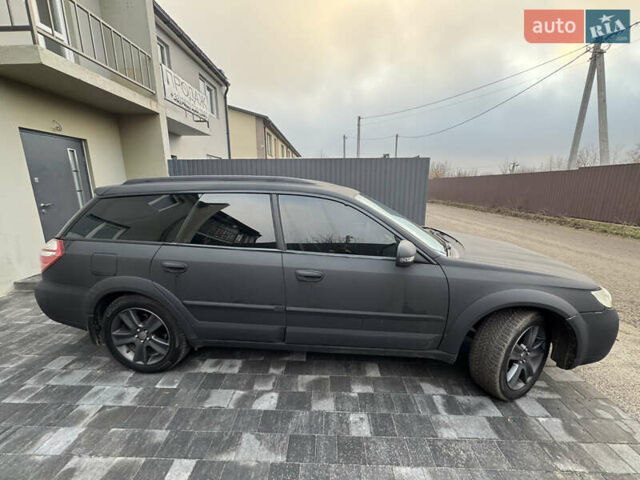 Черный Субару Аутбек, объемом двигателя 2.46 л и пробегом 272 тыс. км за 9000 $, фото 2 на Automoto.ua