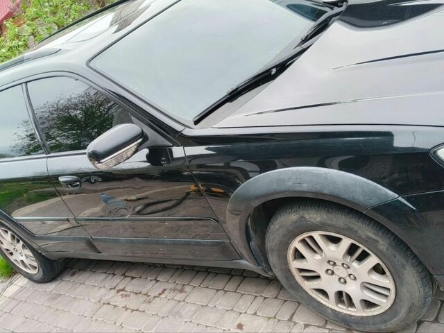 Черный Субару Аутбек, объемом двигателя 2.5 л и пробегом 280 тыс. км за 5000 $, фото 2 на Automoto.ua