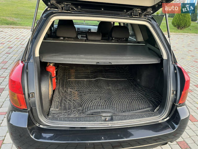 Черный Субару Аутбек, объемом двигателя 2.5 л и пробегом 325 тыс. км за 6600 $, фото 12 на Automoto.ua