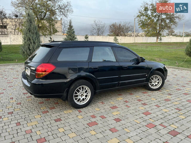 Черный Субару Аутбек, объемом двигателя 2.5 л и пробегом 325 тыс. км за 6600 $, фото 2 на Automoto.ua