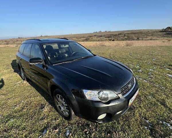 Черный Субару Аутбек, объемом двигателя 2.46 л и пробегом 370 тыс. км за 5000 $, фото 1 на Automoto.ua