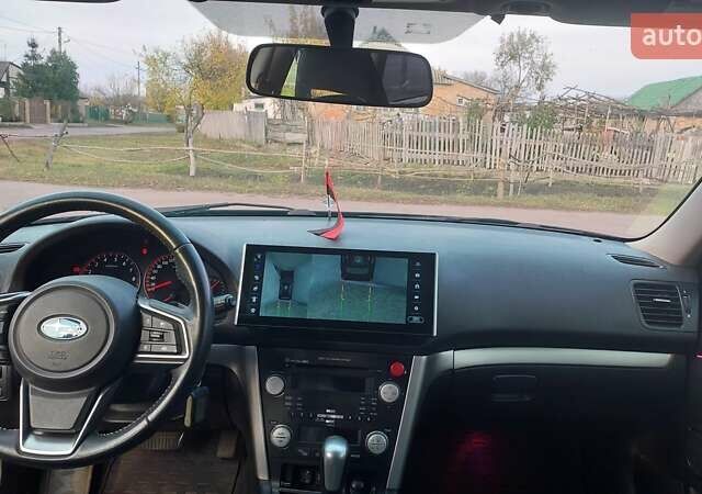 Черный Субару Аутбек, объемом двигателя 3 л и пробегом 325 тыс. км за 8500 $, фото 2 на Automoto.ua