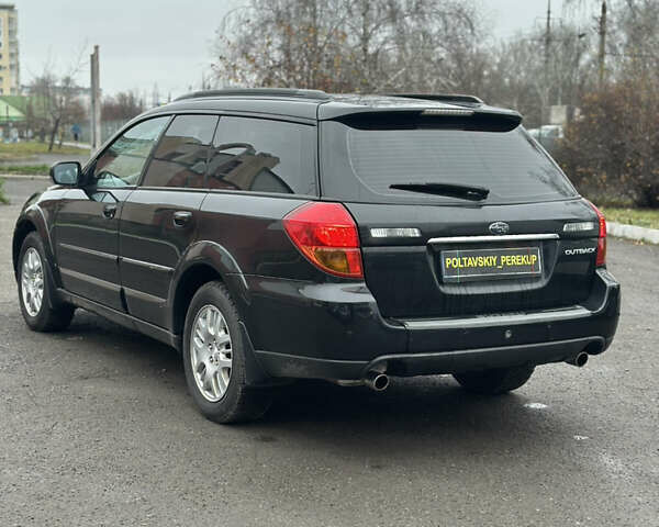 Черный Субару Аутбек, объемом двигателя 2.5 л и пробегом 256 тыс. км за 5400 $, фото 3 на Automoto.ua