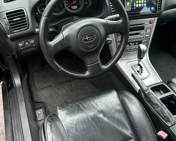 Черный Субару Аутбек, объемом двигателя 2.5 л и пробегом 256 тыс. км за 5400 $, фото 10 на Automoto.ua