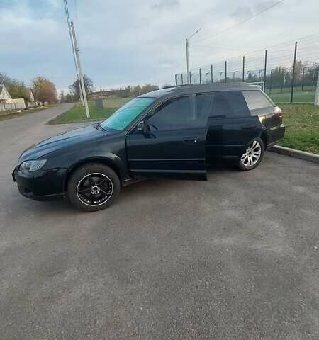 Черный Субару Аутбек, объемом двигателя 3 л и пробегом 325 тыс. км за 8500 $, фото 1 на Automoto.ua