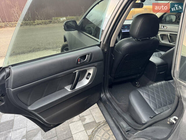 Черный Субару Аутбек, объемом двигателя 2.46 л и пробегом 272 тыс. км за 9000 $, фото 13 на Automoto.ua