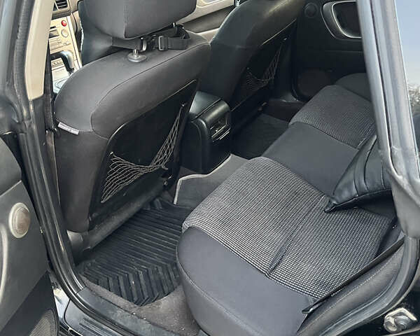 Черный Субару Аутбек, объемом двигателя 2.5 л и пробегом 325 тыс. км за 6600 $, фото 10 на Automoto.ua