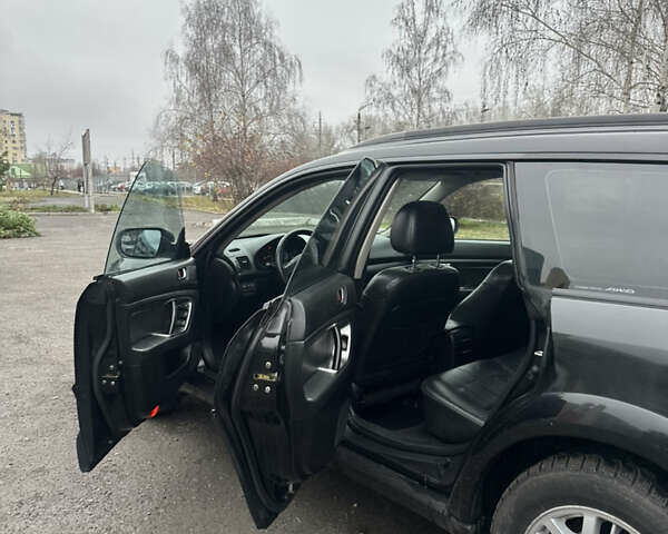 Черный Субару Аутбек, объемом двигателя 2.5 л и пробегом 256 тыс. км за 5400 $, фото 18 на Automoto.ua