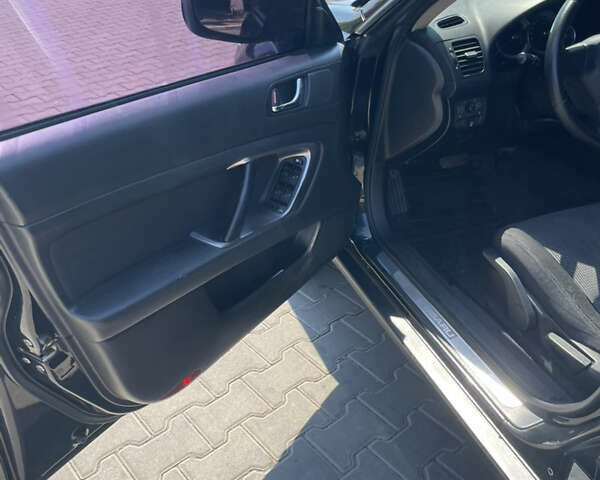 Чорний Субару Аутбек, об'ємом двигуна 2.46 л та пробігом 220 тис. км за 6800 $, фото 3 на Automoto.ua