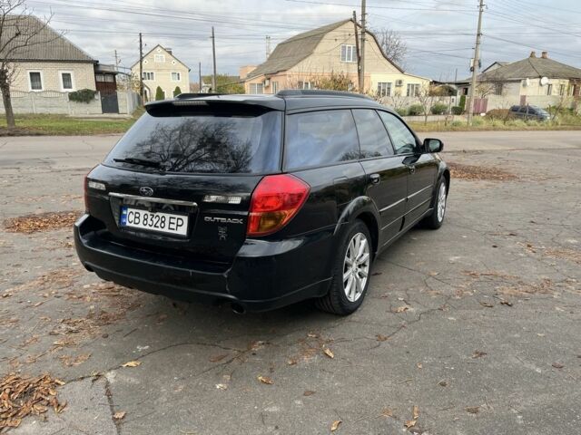 Черный Субару Аутбек, объемом двигателя 2.5 л и пробегом 250 тыс. км за 6700 $, фото 2 на Automoto.ua