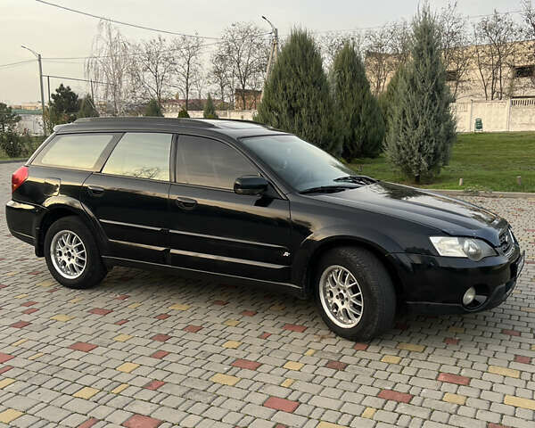 Черный Субару Аутбек, объемом двигателя 2.5 л и пробегом 325 тыс. км за 6600 $, фото 1 на Automoto.ua
