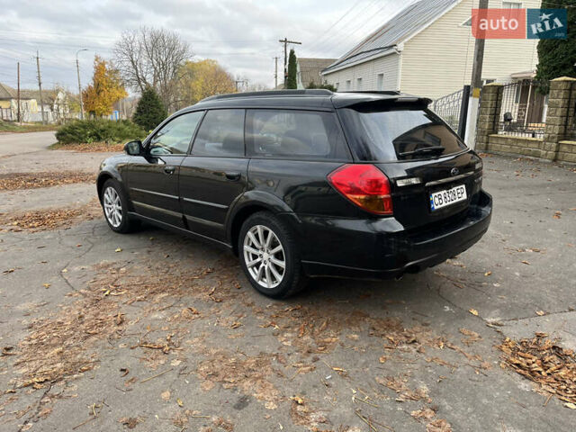 Черный Субару Аутбек, объемом двигателя 2.46 л и пробегом 220 тыс. км за 6700 $, фото 5 на Automoto.ua